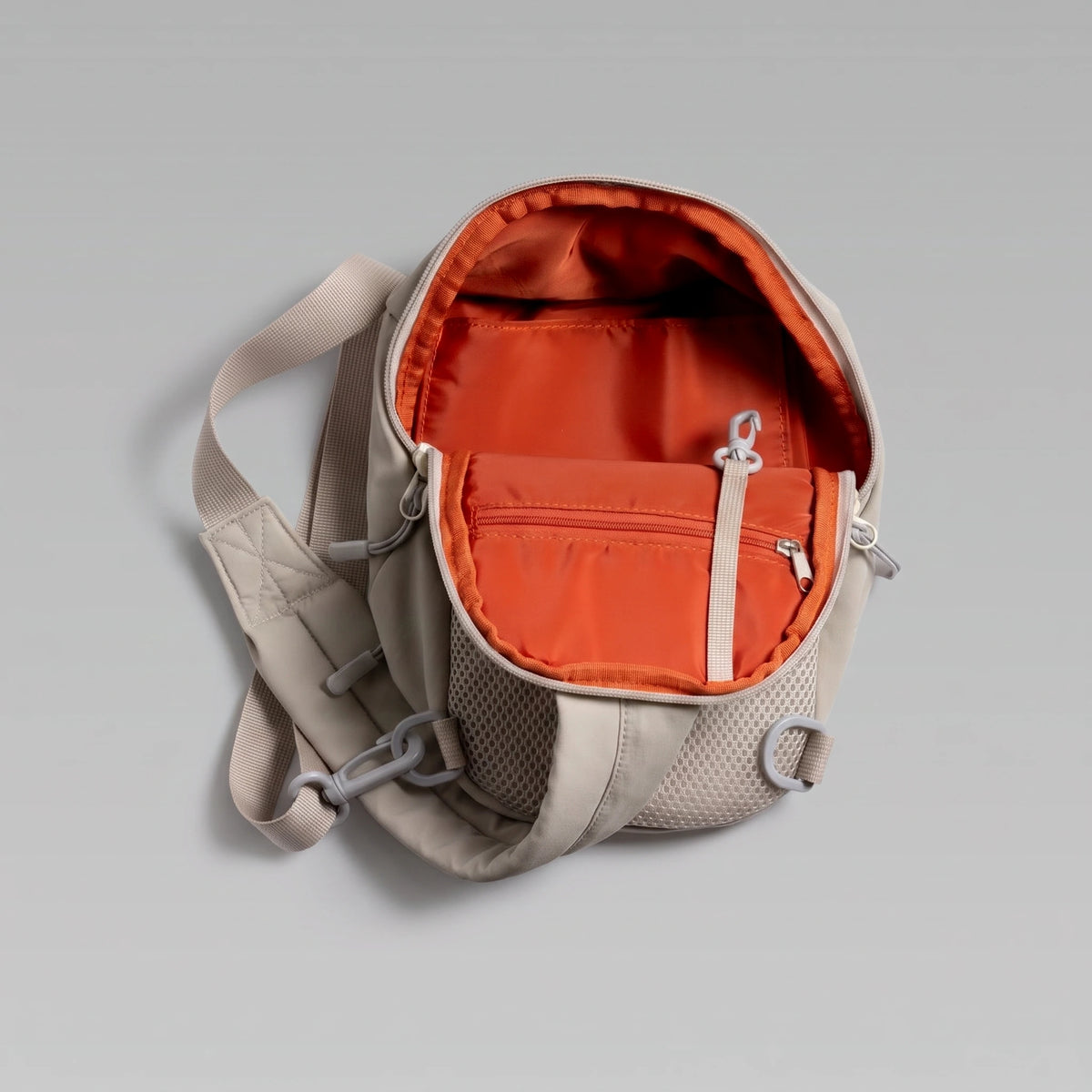 hybeks Drift Sling in Morning Fog, main compartment open.