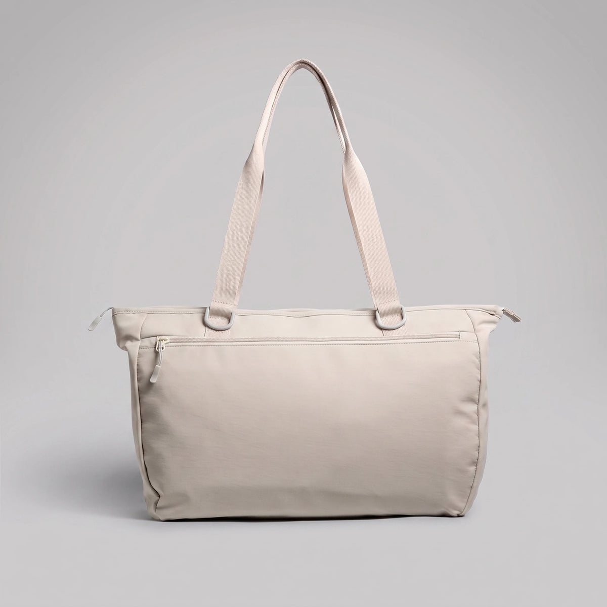 hybeks Drift Tote in Morning Fog, back panel with the handles up.