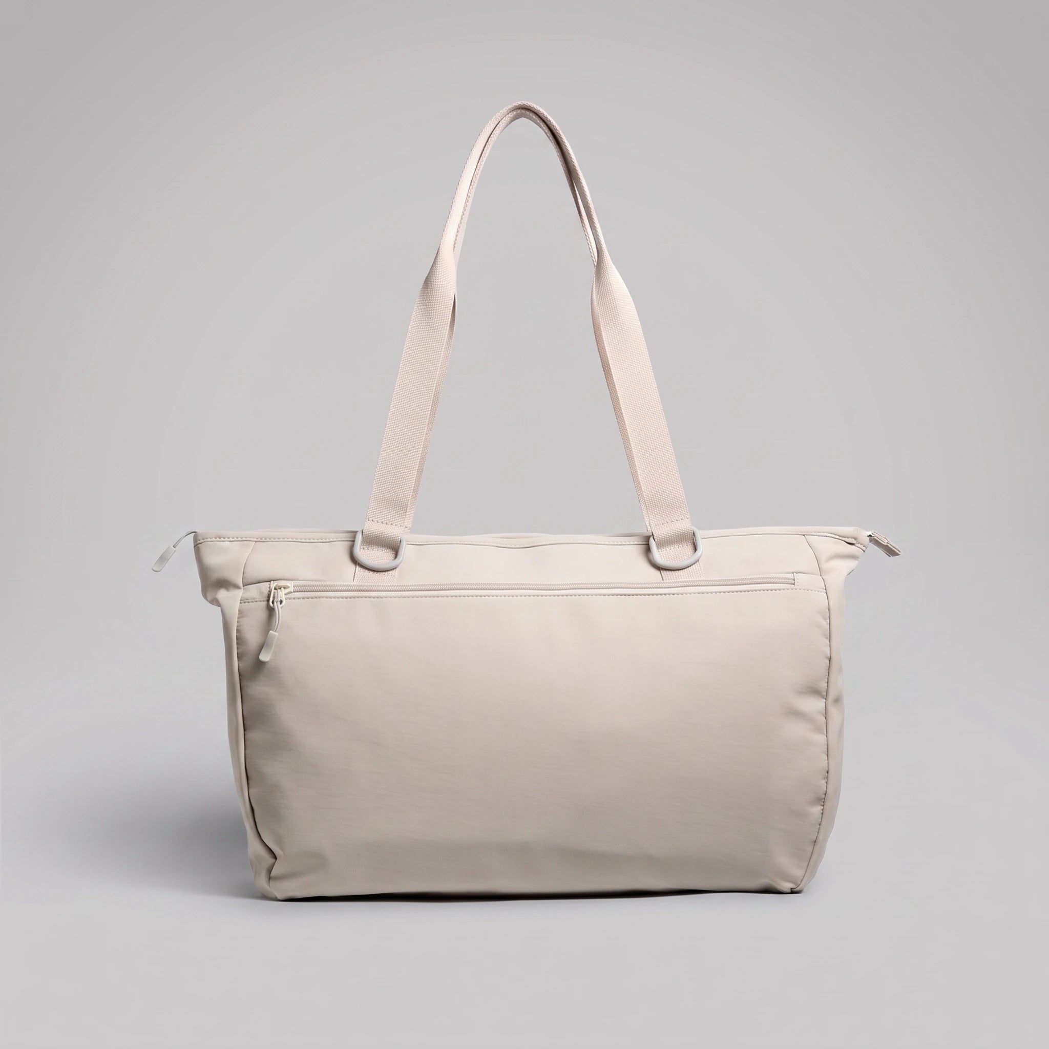 hybeks Drift Tote in Morning Fog, back panel with the handles up.